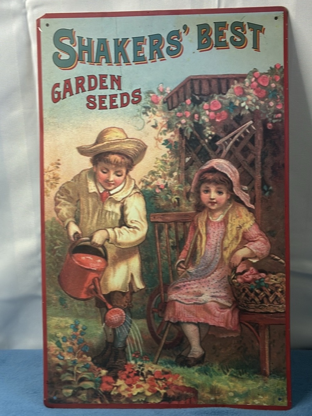 Vintage Shakers’ Best Garden Seeds Metal Sign - Red & Pink